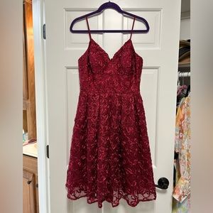 Nicole Miller maroon fit and flare dress in a beautiful floral pattern. Size 6